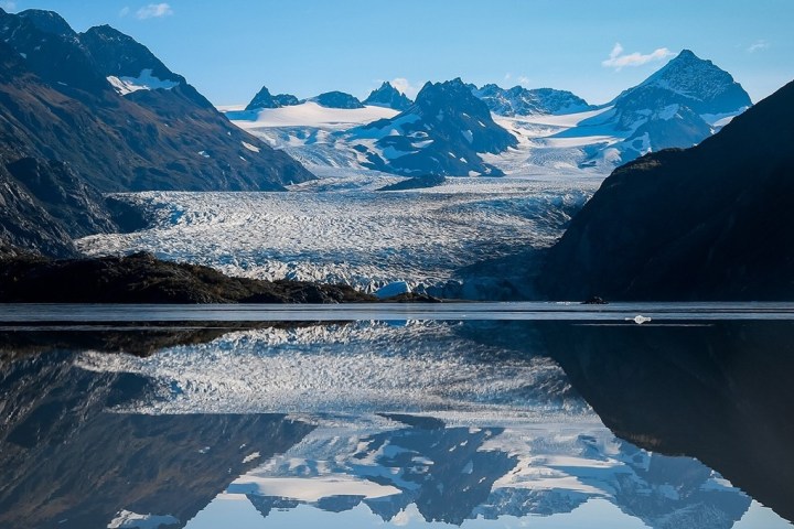a lake with a mountain in the background