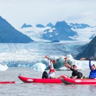 a group of people on a boat in the water